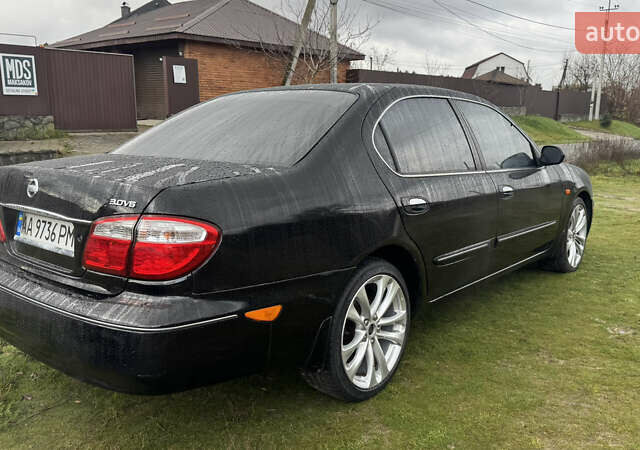 Черный Ниссан Максима, объемом двигателя 2.99 л и пробегом 340 тыс. км за 3999 $, фото 4 на Automoto.ua