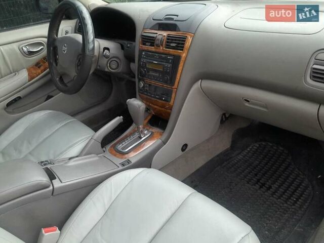 Черный Ниссан Максима, объемом двигателя 3 л и пробегом 343 тыс. км за 3200 $, фото 2 на Automoto.ua