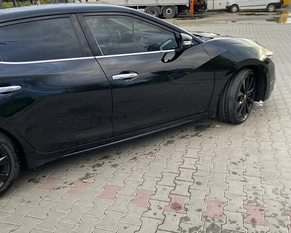 Черный Ниссан Максима, объемом двигателя 3.5 л и пробегом 135 тыс. км за 17200 $, фото 1 на Automoto.ua