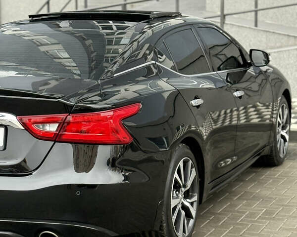 Черный Ниссан Максима, объемом двигателя 3.5 л и пробегом 102 тыс. км за 14900 $, фото 22 на Automoto.ua