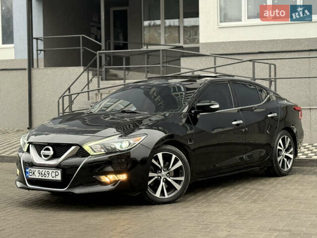 Черный Ниссан Максима, объемом двигателя 3.5 л и пробегом 102 тыс. км за 14900 $, фото 4 на Automoto.ua
