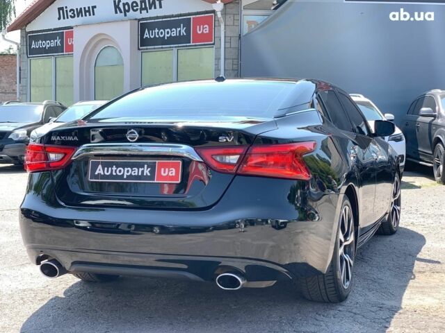 Черный Ниссан Максима, объемом двигателя 3.5 л и пробегом 140 тыс. км за 15890 $, фото 4 на Automoto.ua
