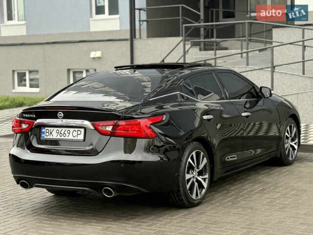 Черный Ниссан Максима, объемом двигателя 3.5 л и пробегом 102 тыс. км за 14900 $, фото 21 на Automoto.ua