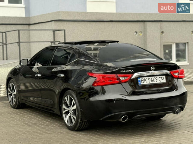 Черный Ниссан Максима, объемом двигателя 3.5 л и пробегом 102 тыс. км за 14900 $, фото 18 на Automoto.ua