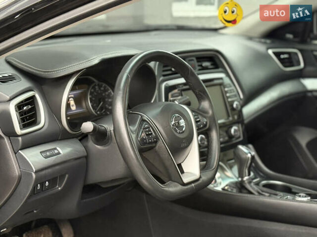 Черный Ниссан Максима, объемом двигателя 3.5 л и пробегом 102 тыс. км за 14900 $, фото 24 на Automoto.ua