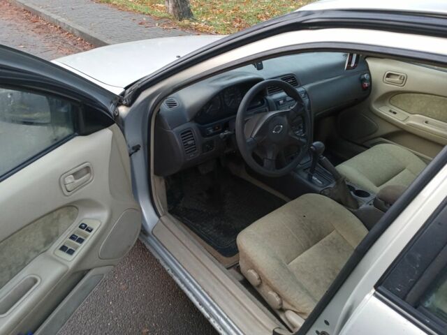 Коричневий Ніссан Максіма, об'ємом двигуна 2 л та пробігом 250 тис. км за 1950 $, фото 5 на Automoto.ua