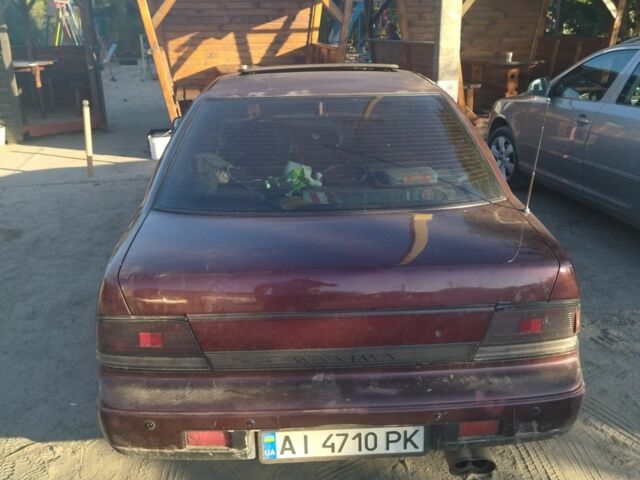 Красный Ниссан Максима, объемом двигателя 3 л и пробегом 337 тыс. км за 1500 $, фото 4 на Automoto.ua