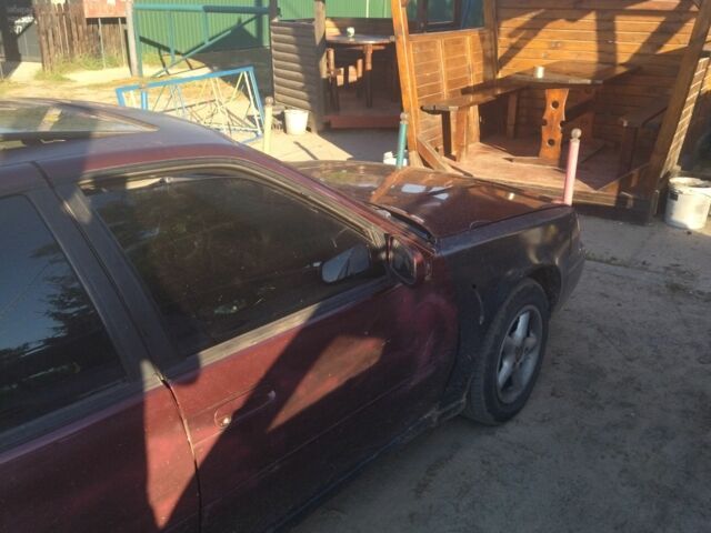 Красный Ниссан Максима, объемом двигателя 3 л и пробегом 337 тыс. км за 1500 $, фото 6 на Automoto.ua