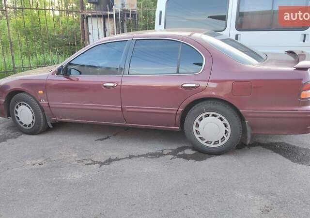 Червоний Ніссан Максіма, об'ємом двигуна 2.99 л та пробігом 450 тис. км за 2300 $, фото 8 на Automoto.ua