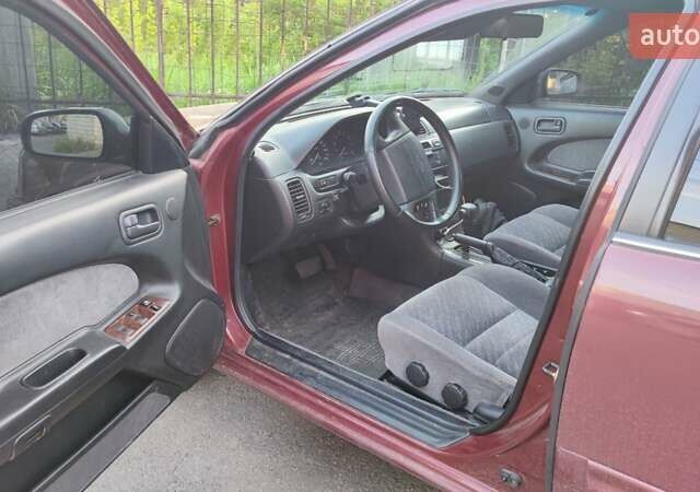 Червоний Ніссан Максіма, об'ємом двигуна 2.99 л та пробігом 450 тис. км за 2300 $, фото 9 на Automoto.ua