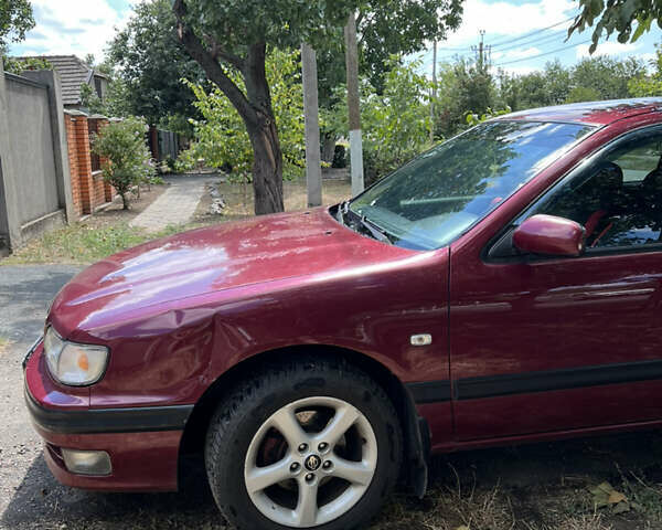 Красный Ниссан Максима, объемом двигателя 2 л и пробегом 242 тыс. км за 3200 $, фото 6 на Automoto.ua