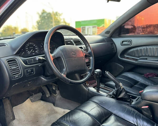 Красный Ниссан Максима, объемом двигателя 2 л и пробегом 317 тыс. км за 1900 $, фото 4 на Automoto.ua