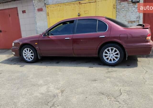 Червоний Ніссан Максіма, об'ємом двигуна 2.99 л та пробігом 450 тис. км за 2300 $, фото 4 на Automoto.ua