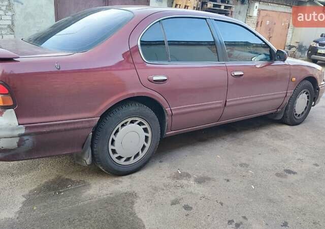 Червоний Ніссан Максіма, об'ємом двигуна 2.99 л та пробігом 450 тис. км за 2300 $, фото 6 на Automoto.ua
