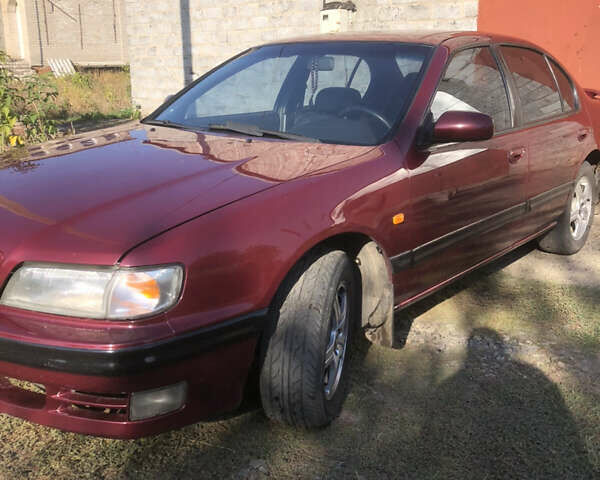 Красный Ниссан Максима, объемом двигателя 2 л и пробегом 226 тыс. км за 5100 $, фото 3 на Automoto.ua