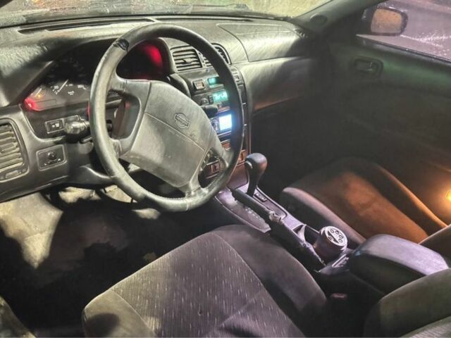 Червоний Ніссан Максіма, об'ємом двигуна 3 л та пробігом 378 тис. км за 1650 $, фото 5 на Automoto.ua