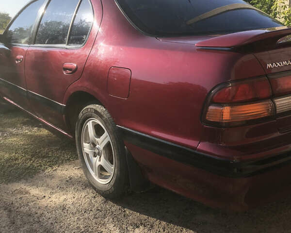 Красный Ниссан Максима, объемом двигателя 2 л и пробегом 226 тыс. км за 5100 $, фото 5 на Automoto.ua