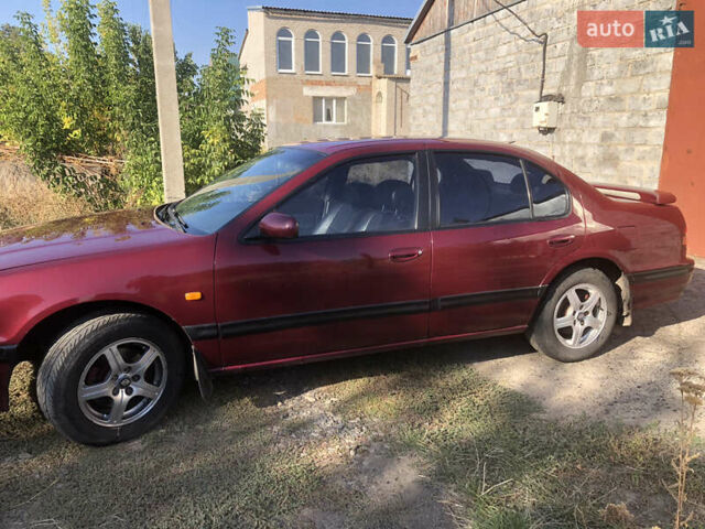 Красный Ниссан Максима, объемом двигателя 2 л и пробегом 231 тыс. км за 2800 $, фото 5 на Automoto.ua