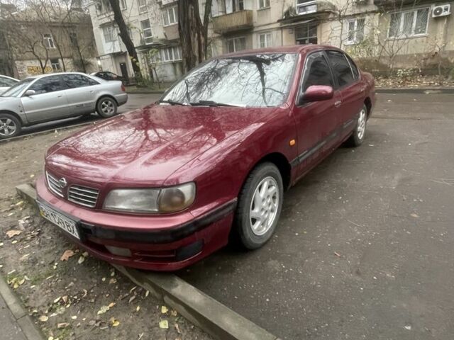 Червоний Ніссан Максіма, об'ємом двигуна 3 л та пробігом 378 тис. км за 1650 $, фото 1 на Automoto.ua
