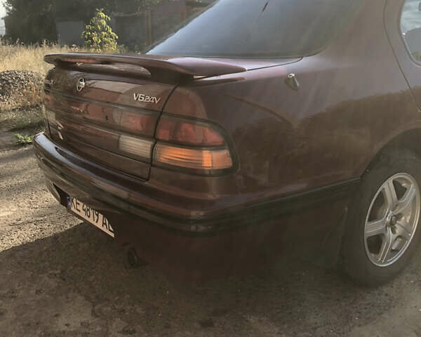Красный Ниссан Максима, объемом двигателя 2 л и пробегом 226 тыс. км за 5100 $, фото 6 на Automoto.ua