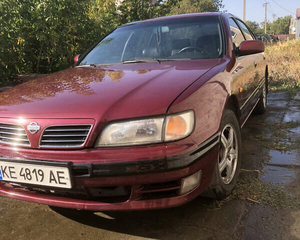 Красный Ниссан Максима, объемом двигателя 2 л и пробегом 226 тыс. км за 5100 $, фото 1 на Automoto.ua