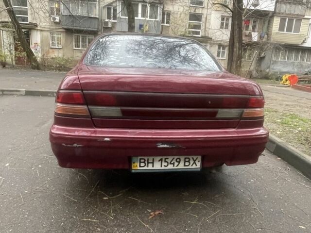 Червоний Ніссан Максіма, об'ємом двигуна 3 л та пробігом 378 тис. км за 1650 $, фото 3 на Automoto.ua