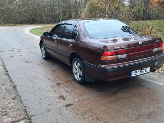 Ниссан Максима 1997 в Прилуках на Automoto.ua Красный Ниссан Максима, объемом двигателя 2 л и пробегом 450 тыс. км за 3400 $, фото 3 на Automoto.ua