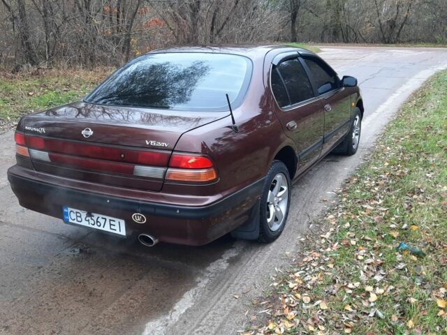 Ниссан Максима 1997 в Прилуках на Automoto.ua Красный Ниссан Максима, объемом двигателя 2 л и пробегом 450 тыс. км за 3400 $, фото 2 на Automoto.ua