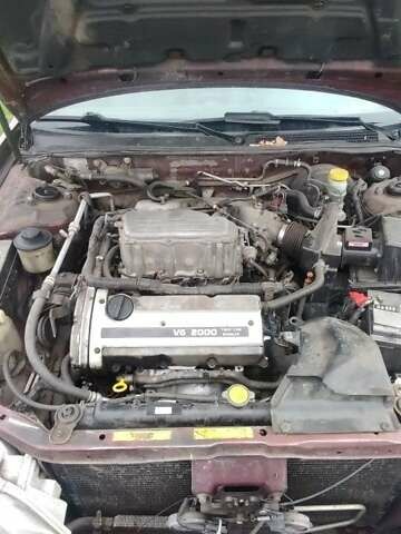 Червоний Ніссан Максіма, об'ємом двигуна 2 л та пробігом 390 тис. км за 2500 $, фото 15 на Automoto.ua