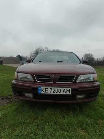 Червоний Ніссан Максіма, об'ємом двигуна 2 л та пробігом 390 тис. км за 2500 $, фото 16 на Automoto.ua