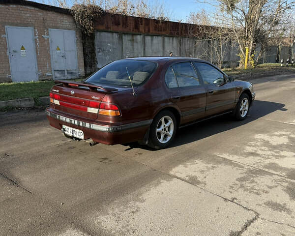 Красный Ниссан Максима, объемом двигателя 2 л и пробегом 284 тыс. км за 1800 $, фото 2 на Automoto.ua