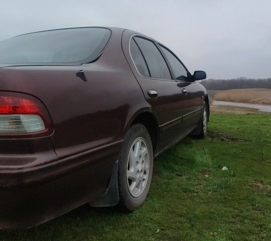 Червоний Ніссан Максіма, об'ємом двигуна 2 л та пробігом 390 тис. км за 2500 $, фото 4 на Automoto.ua