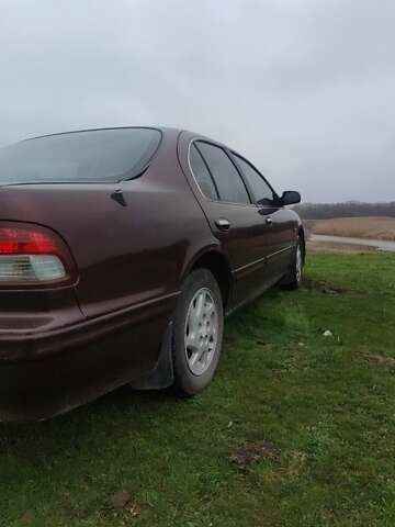 Червоний Ніссан Максіма, об'ємом двигуна 2 л та пробігом 390 тис. км за 2500 $, фото 3 на Automoto.ua