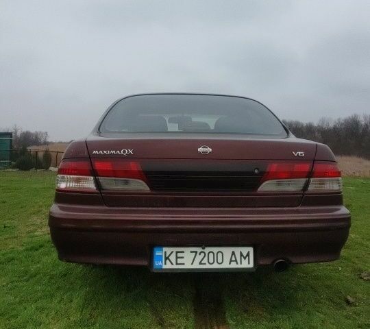 Червоний Ніссан Максіма, об'ємом двигуна 2 л та пробігом 390 тис. км за 2500 $, фото 3 на Automoto.ua