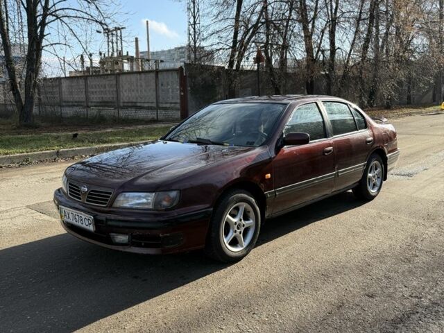 Червоний Ніссан Максіма, об'ємом двигуна 2 л та пробігом 283 тис. км за 1800 $, фото 1 на Automoto.ua