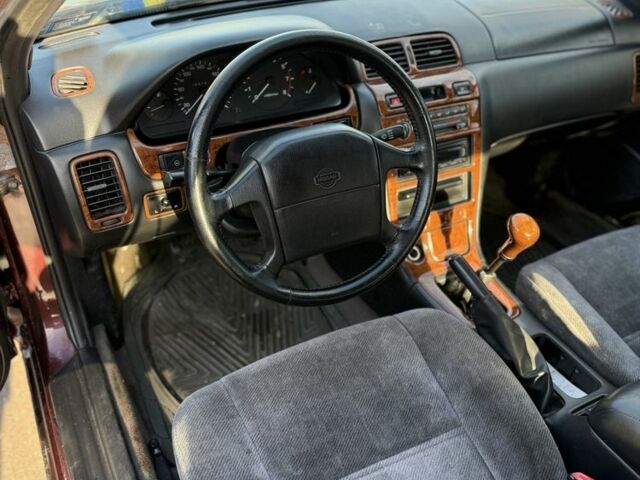 Червоний Ніссан Максіма, об'ємом двигуна 2 л та пробігом 283 тис. км за 1800 $, фото 4 на Automoto.ua