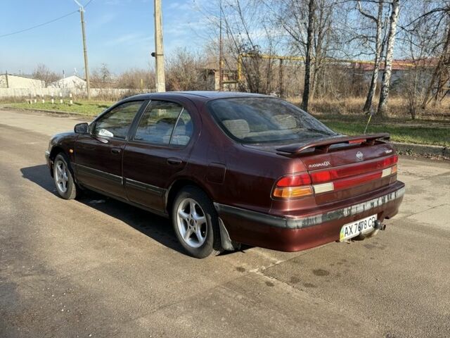 Червоний Ніссан Максіма, об'ємом двигуна 2 л та пробігом 283 тис. км за 1800 $, фото 3 на Automoto.ua