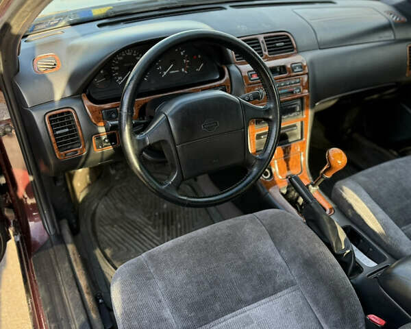 Красный Ниссан Максима, объемом двигателя 2 л и пробегом 284 тыс. км за 1800 $, фото 4 на Automoto.ua