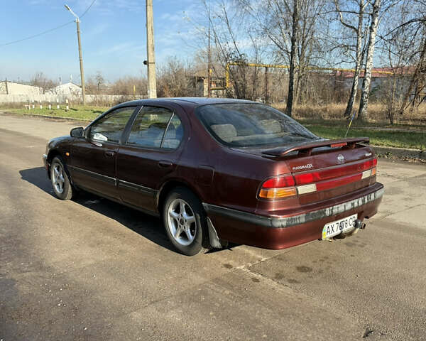 Красный Ниссан Максима, объемом двигателя 2 л и пробегом 284 тыс. км за 1800 $, фото 3 на Automoto.ua