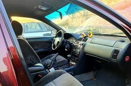 Красный Ниссан Максима, объемом двигателя 2 л и пробегом 490 тыс. км за 1300 $, фото 2 на Automoto.ua