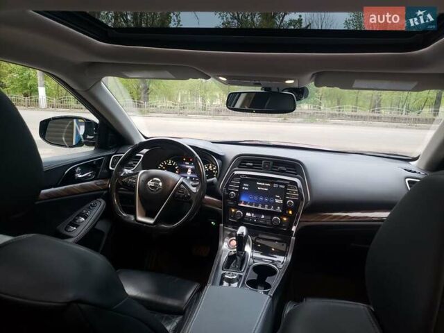 Красный Ниссан Максима, объемом двигателя 3.5 л и пробегом 190 тыс. км за 14900 $, фото 13 на Automoto.ua