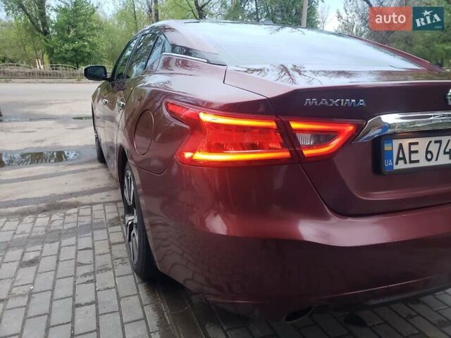 Красный Ниссан Максима, объемом двигателя 3.5 л и пробегом 190 тыс. км за 14900 $, фото 5 на Automoto.ua