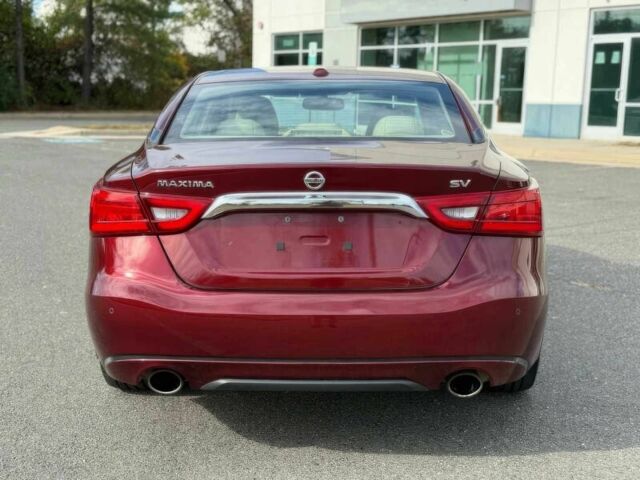 Червоний Ніссан Максіма, об'ємом двигуна 3.5 л та пробігом 75 тис. км за 12000 $, фото 6 на Automoto.ua
