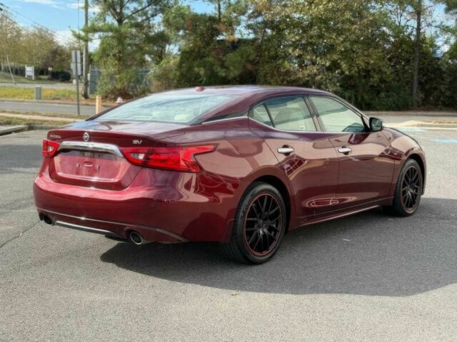 Червоний Ніссан Максіма, об'ємом двигуна 3.5 л та пробігом 75 тис. км за 12000 $, фото 5 на Automoto.ua