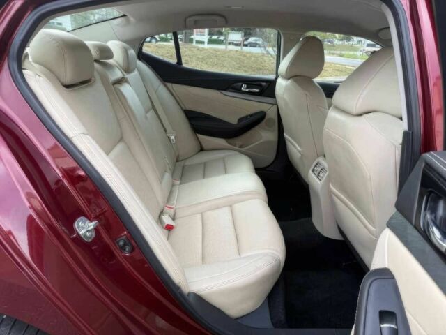 Червоний Ніссан Максіма, об'ємом двигуна 3.5 л та пробігом 75 тис. км за 12000 $, фото 11 на Automoto.ua