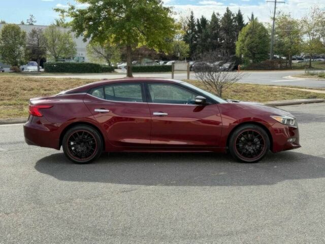 Червоний Ніссан Максіма, об'ємом двигуна 3.5 л та пробігом 75 тис. км за 12000 $, фото 3 на Automoto.ua