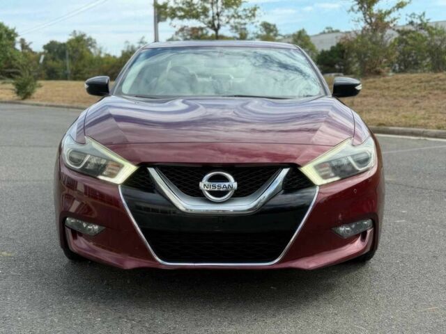 Червоний Ніссан Максіма, об'ємом двигуна 3.5 л та пробігом 75 тис. км за 12000 $, фото 1 на Automoto.ua