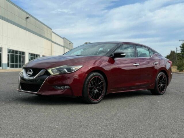 Червоний Ніссан Максіма, об'ємом двигуна 3.5 л та пробігом 75 тис. км за 12000 $, фото 2 на Automoto.ua