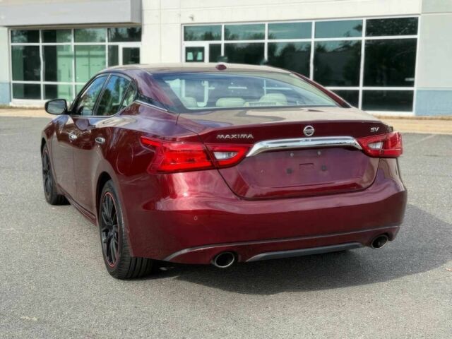 Червоний Ніссан Максіма, об'ємом двигуна 3.5 л та пробігом 75 тис. км за 12000 $, фото 7 на Automoto.ua