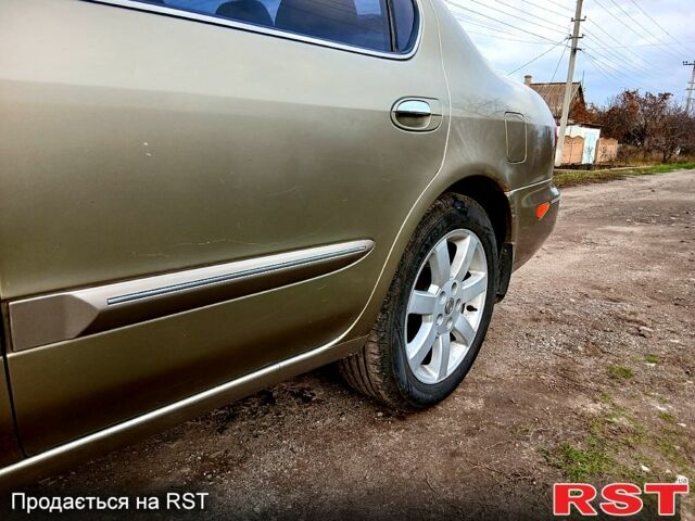 Жовтий Ніссан Максіма, об'ємом двигуна 2 л та пробігом 305 тис. км за 5100 $, фото 5 на Automoto.ua